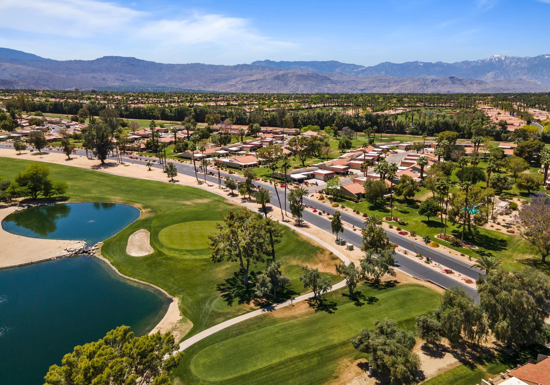 Aerial view of Palm Desert in California with lakes, homes and lots of palm trees