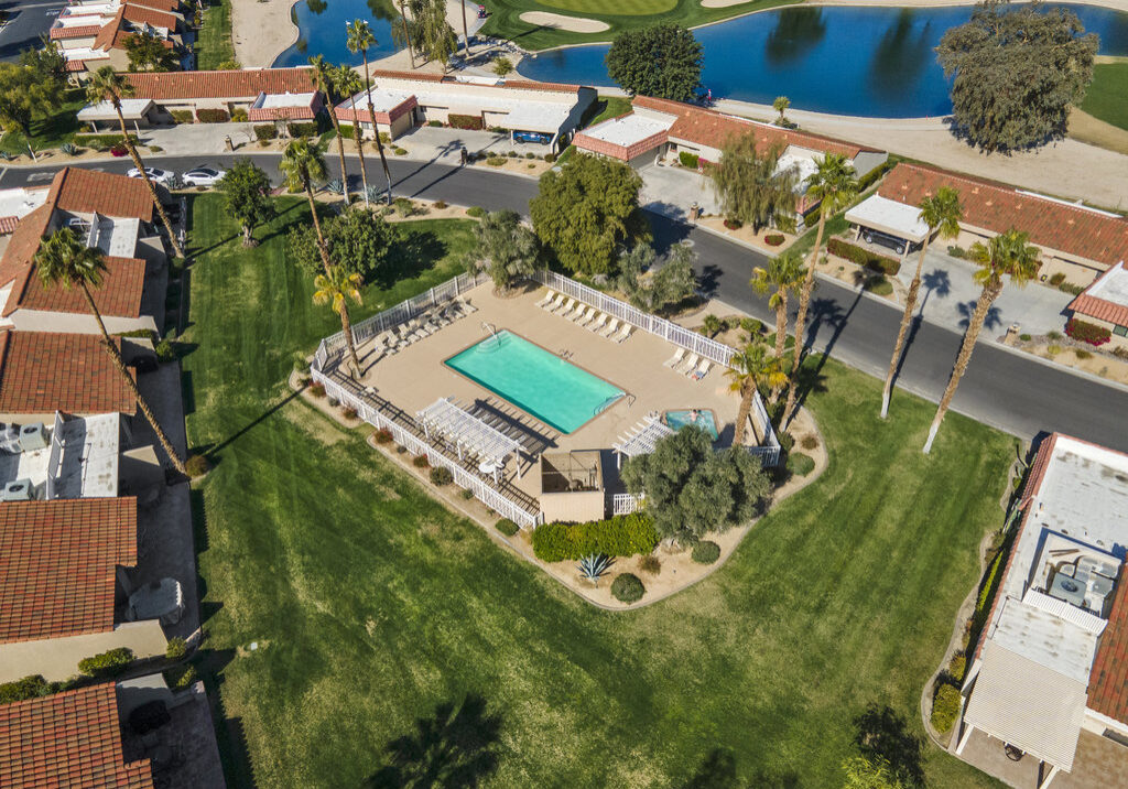 Pool area and housing community aerial view at 41443 Inverness Way